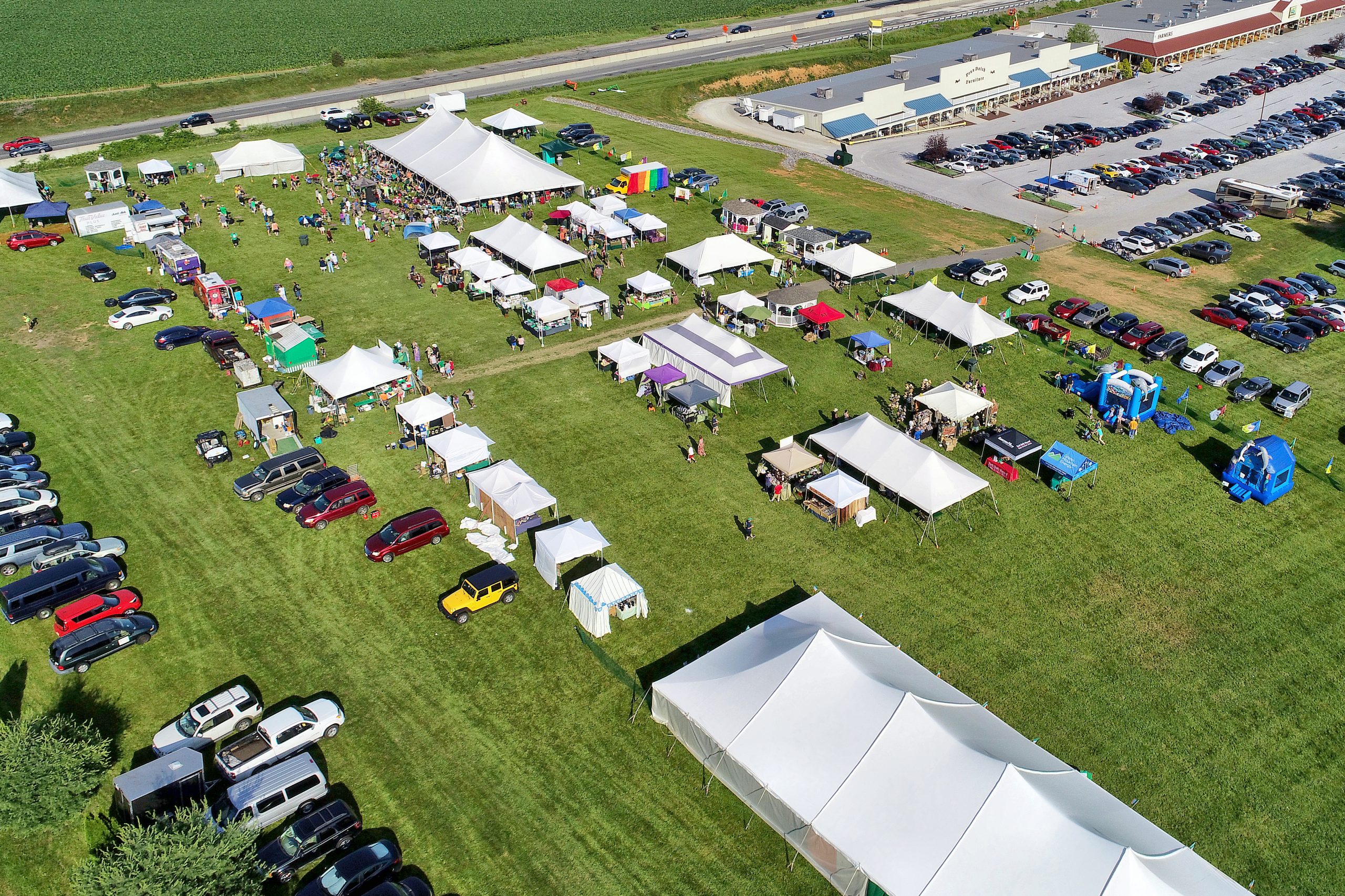 drone view of festival grounds -- contact us to learn more